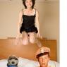Garrisonskunk-woman_bouncing_on_bed