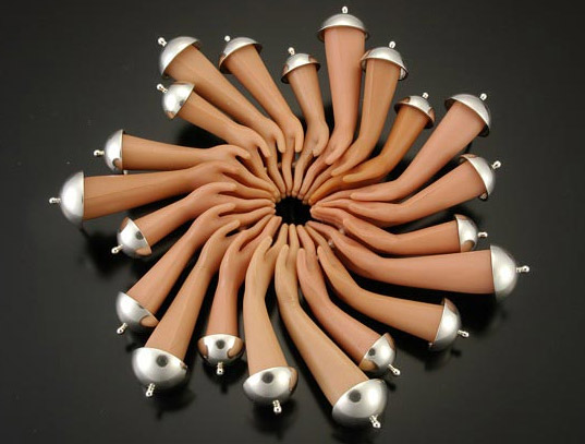 Anonymous-freaky-barbie-hands-brooch